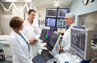 Rutgers Health doctors in a lab 